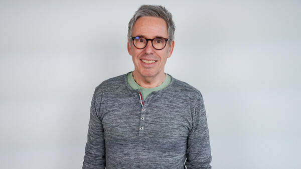 Porträtfoto einer städtischen Mitarbeiterin bzw. eines städtischen Mitarbeiters