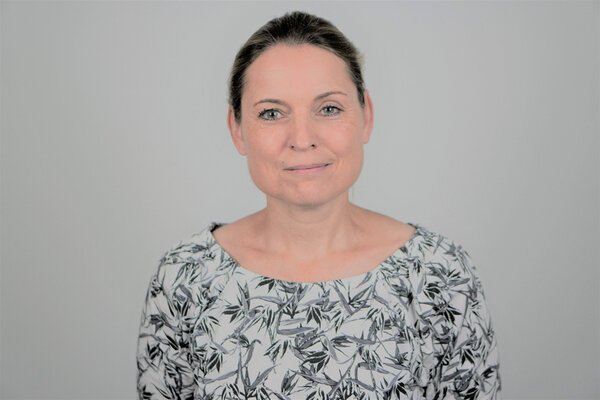 Porträtfoto einer städtischen Mitarbeiterin bzw. eines städtischen Mitarbeiters