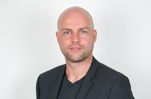 Porträtfoto einer städtischen Mitarbeiterin bzw. eines städtischen Mitarbeiters