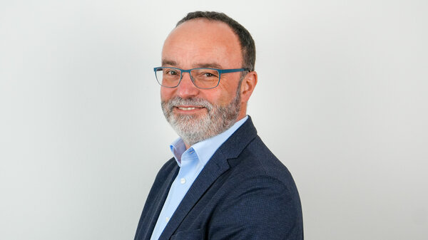 Porträtfoto einer städtischen Mitarbeiterin bzw. eines städtischen Mitarbeiters