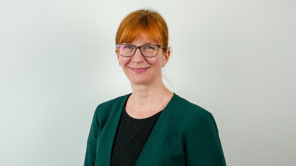 Porträtfoto einer städtischen Mitarbeiterin bzw. eines städtischen Mitarbeiters