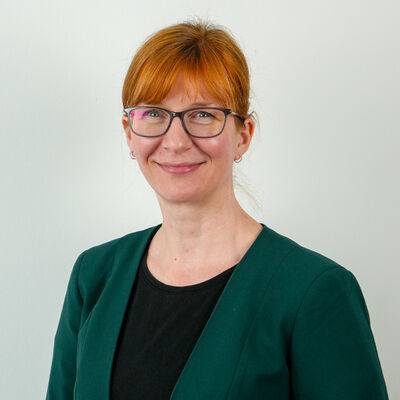 Porträtfoto einer städtischen Mitarbeiterin bzw. eines städtischen Mitarbeiters