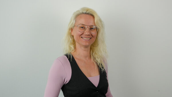Porträtfoto einer städtischen Mitarbeiterin bzw. eines städtischen Mitarbeiters