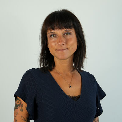 Porträtfoto einer städtischen Mitarbeiterin bzw. eines städtischen Mitarbeiters