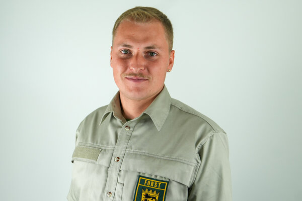 Porträtfoto einer städtischen Mitarbeiterin bzw. eines städtischen Mitarbeiters