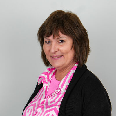 Porträtfoto einer städtischen Mitarbeiterin bzw. eines städtischen Mitarbeiters